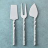 Helix Hammered Cheese Knife Set – 3 Piece Cheese Serving Accessories displayed on a blue background with elegant design.